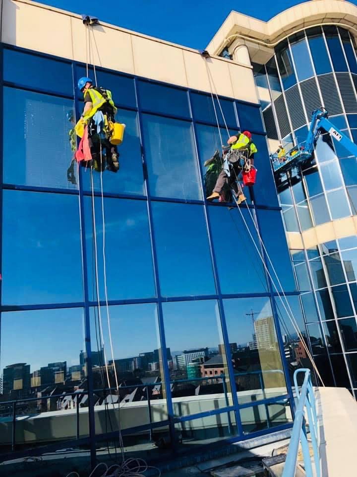 An example of window cleaning by rope access team by CLEAN CCS LTD